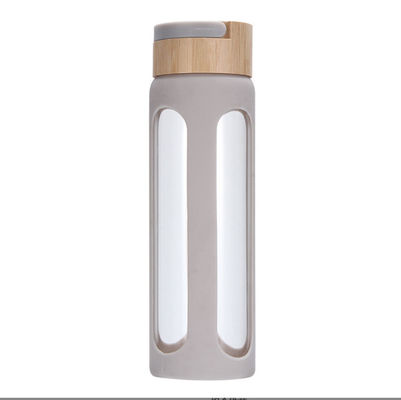 Buy Personalised 550/750ml High Borosilicate Glass Water Bottle Custom Glass Drinking Bottle With Silicone Sleeve And Bamboo Lid Easy To Clean And Maintain online manufacture