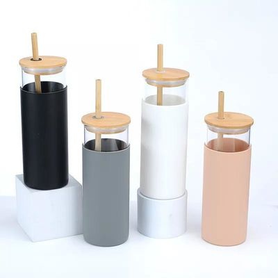 Buy Reusable Design 20oz 17oz Water Bottle Residential Glass Juice Tumbler Glass Drinking Bottle With Silicone Sleeve Eco Friendly Stylish online manufacture